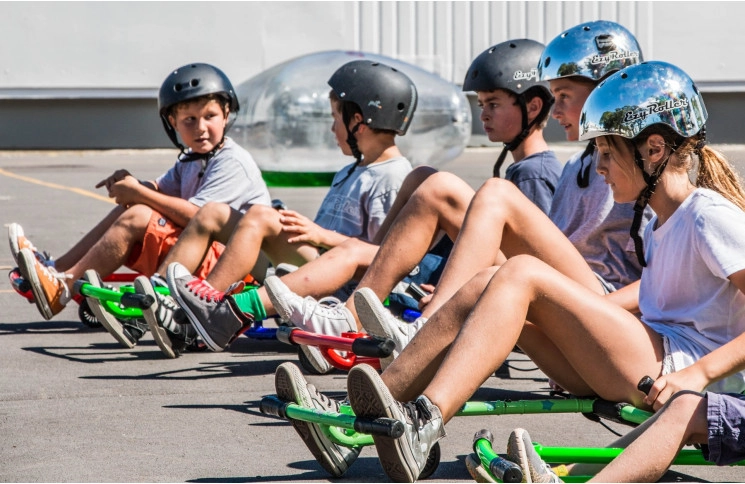 Самокат-каталка Ezyroller Classic, черно-оранжевый.